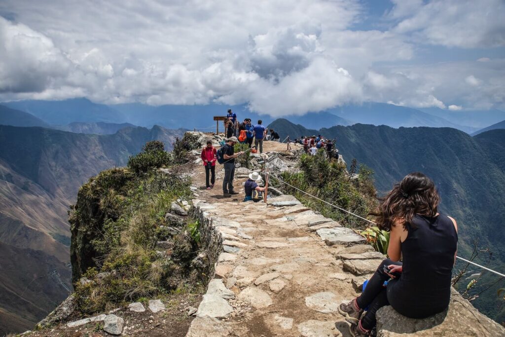 machu-picchu-mountain-summit-tourists-cusco-peru